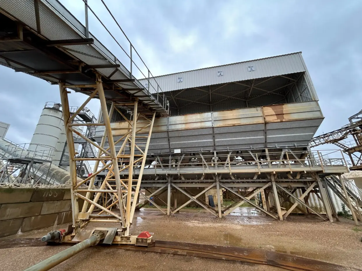 Fresh concrete being poured for a garden shed base in Slough