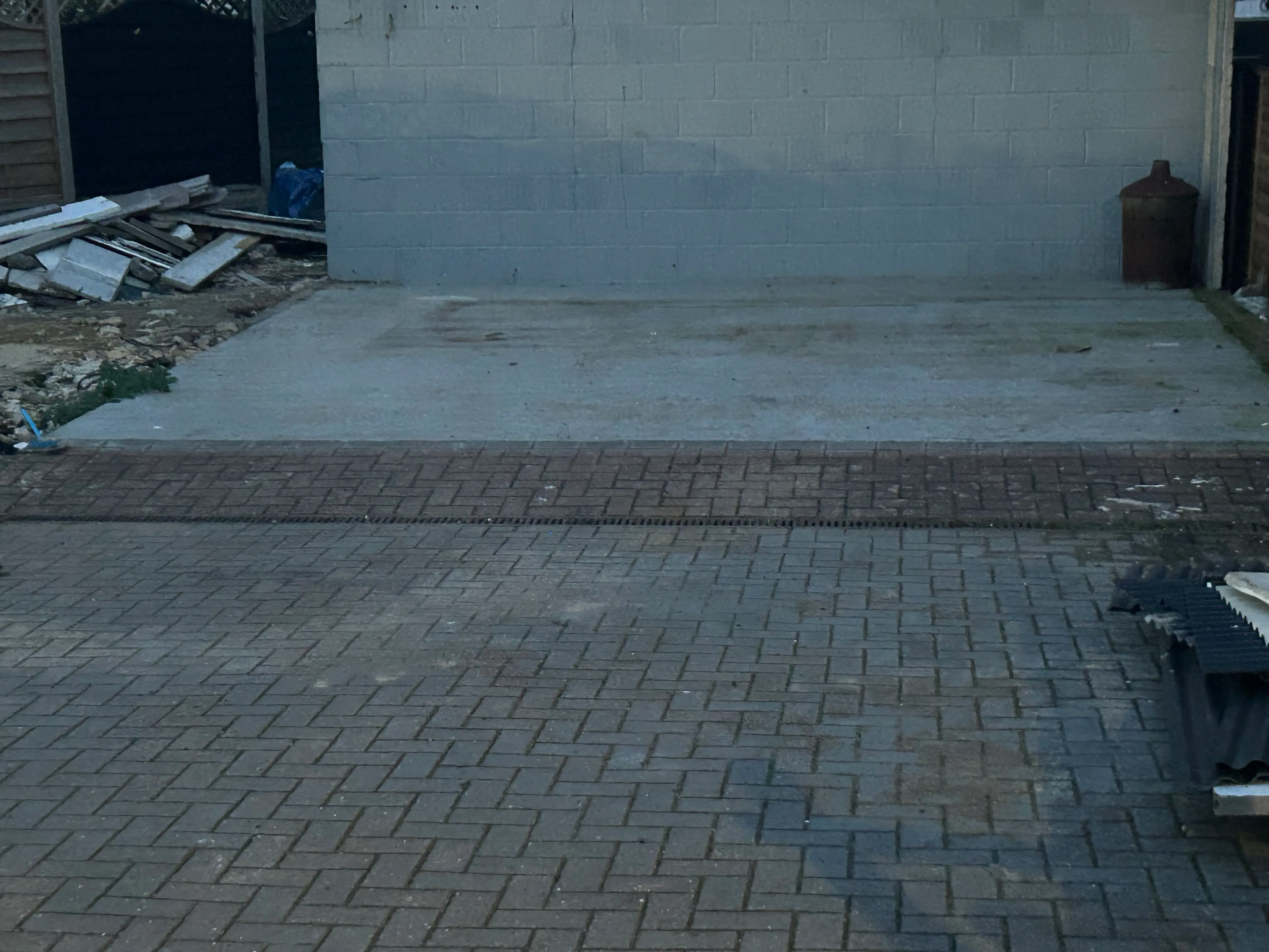 Level concrete base prepared for shed installation